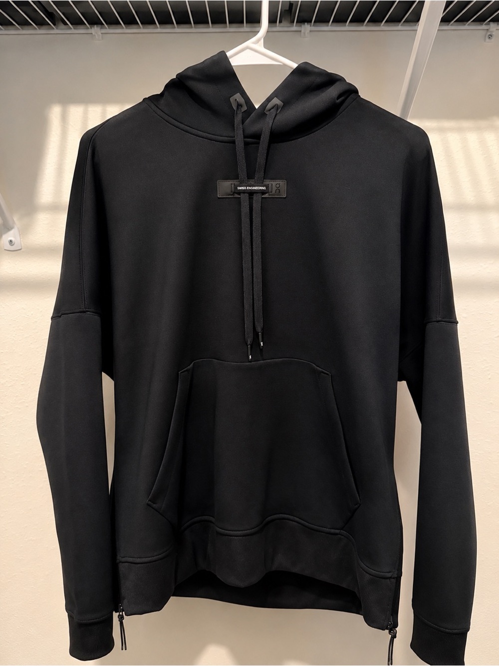 On Running Black Hoodie with 'Swiss Engineering' Detail